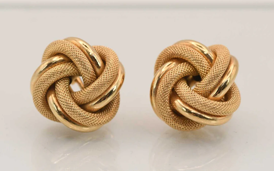 A pair of 9ct yellow gold knot earrings