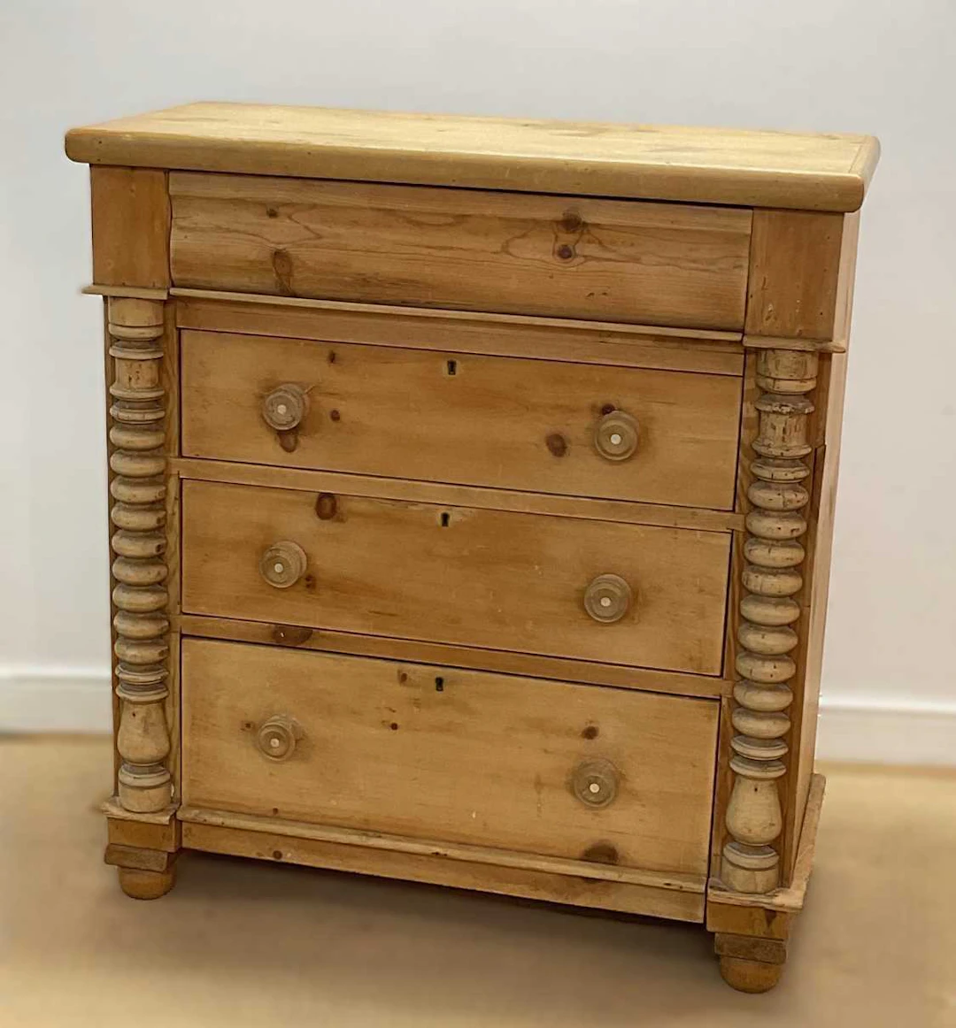 A Scottish pine chest of three drawers