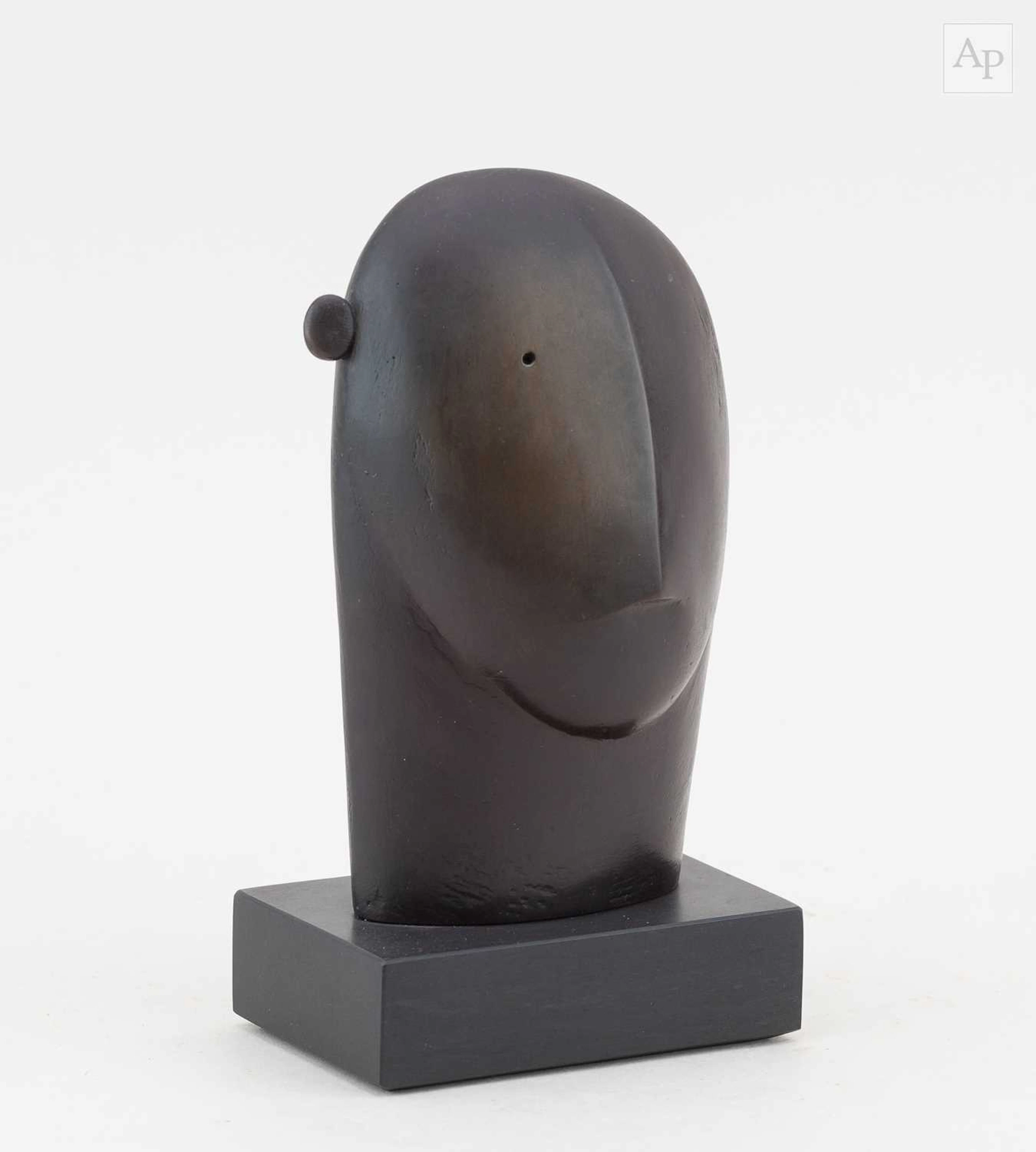 PETER BEARD (born 1951); a bronze stylised bust on a rectangular slate base