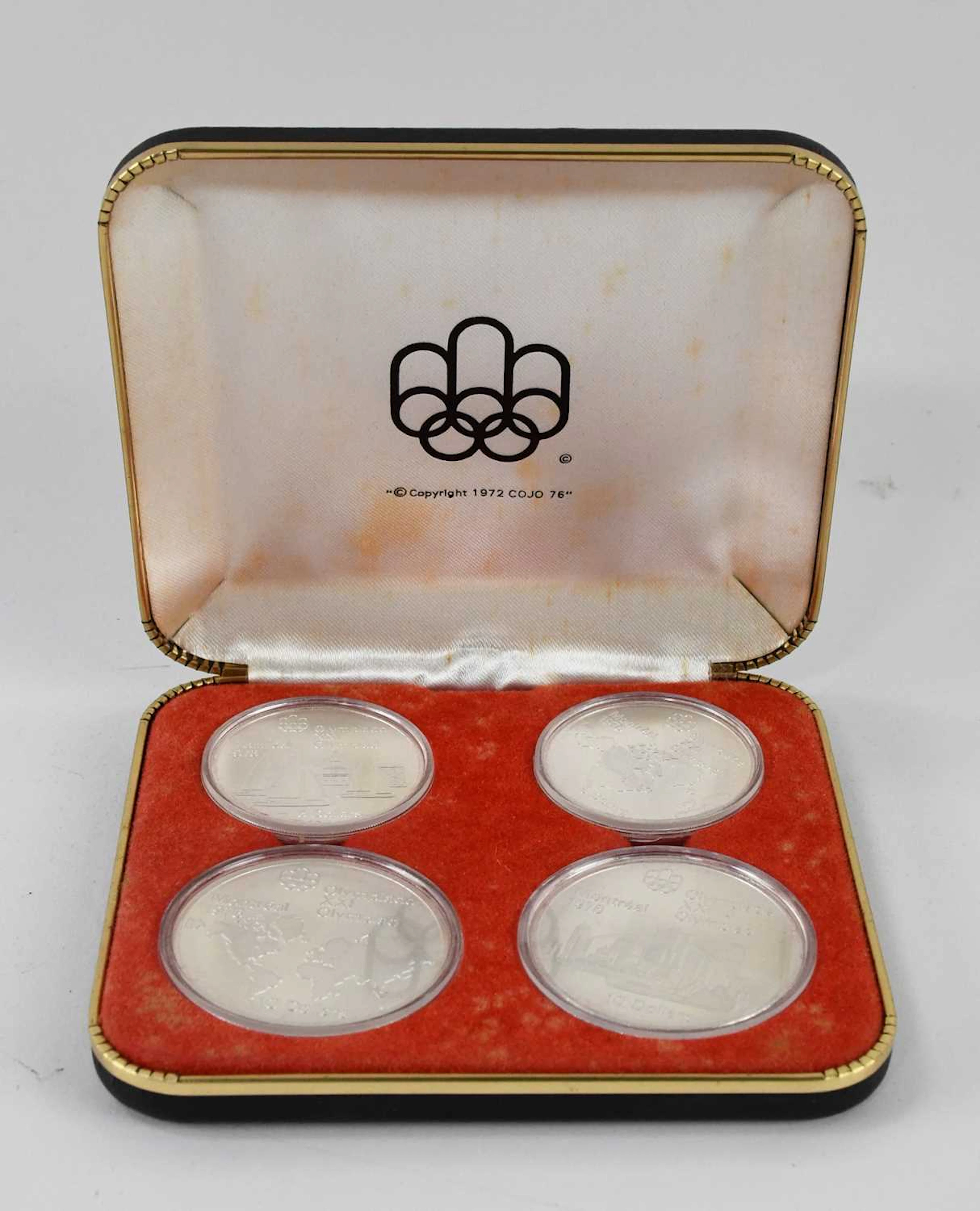 A cased commemorative Elizabeth II 1973 Canadian Olympics...