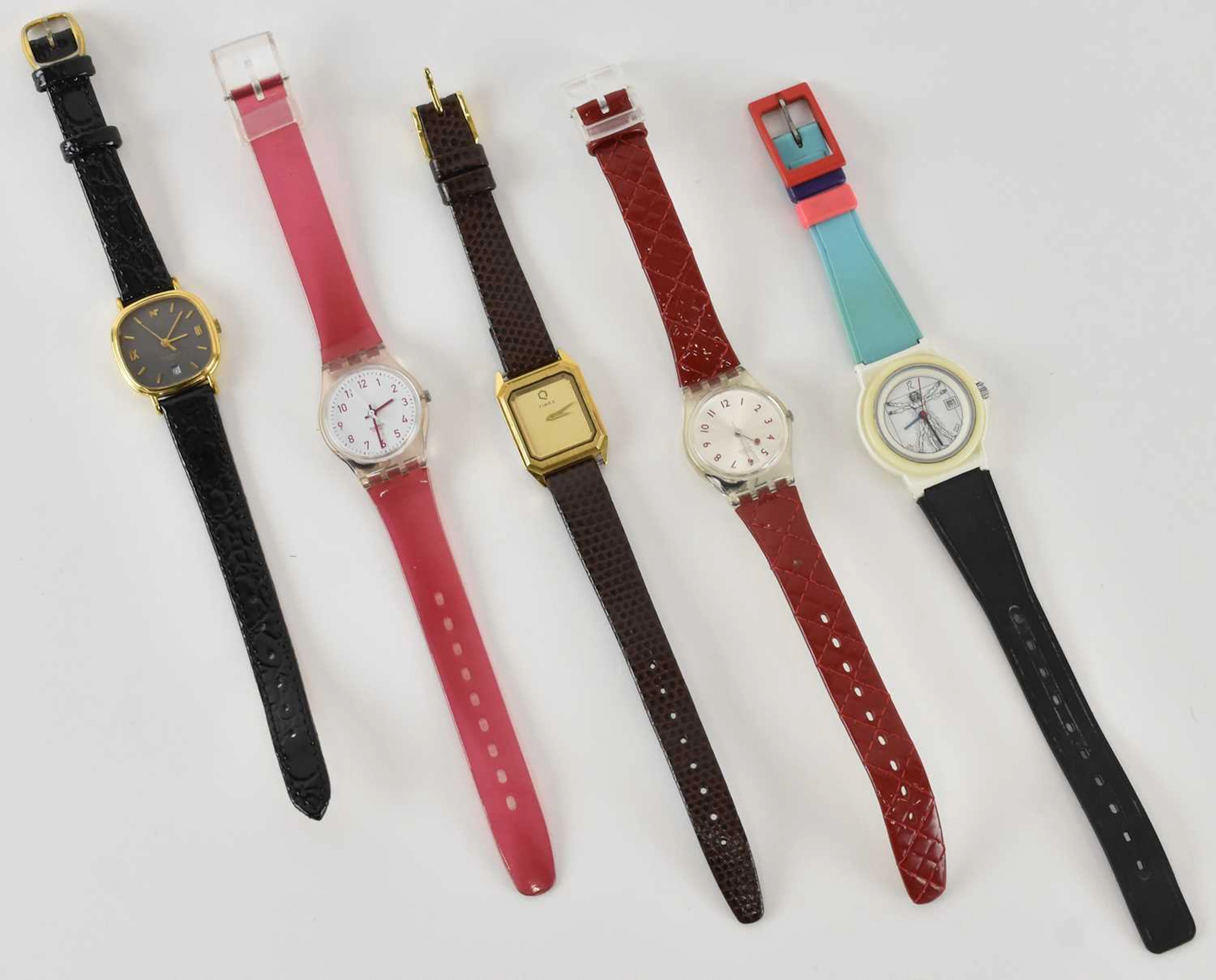 Five assorted lady's wristwatches including two Swatch watches