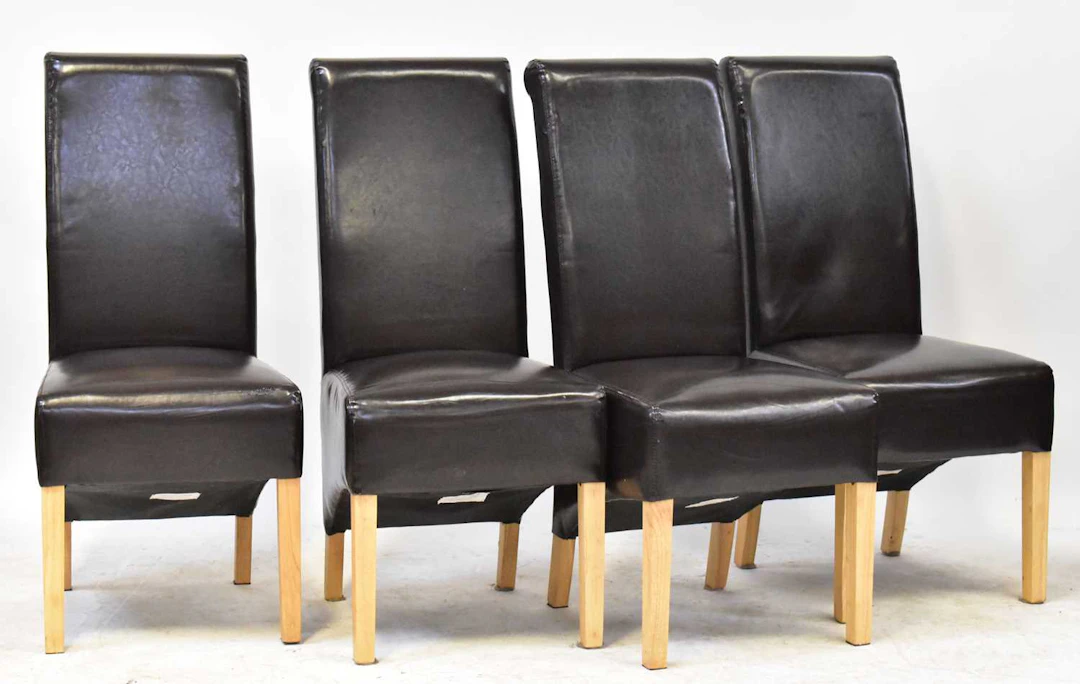 Four modern high back dining chairs