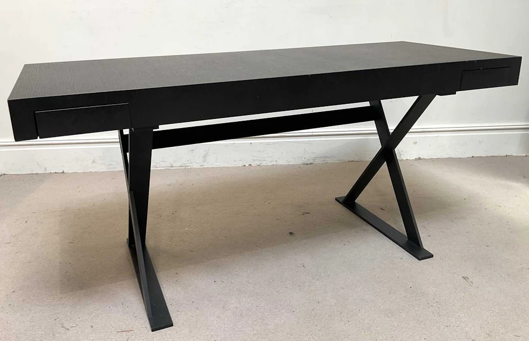 A contemporary ebonised dressing table of rectangular form