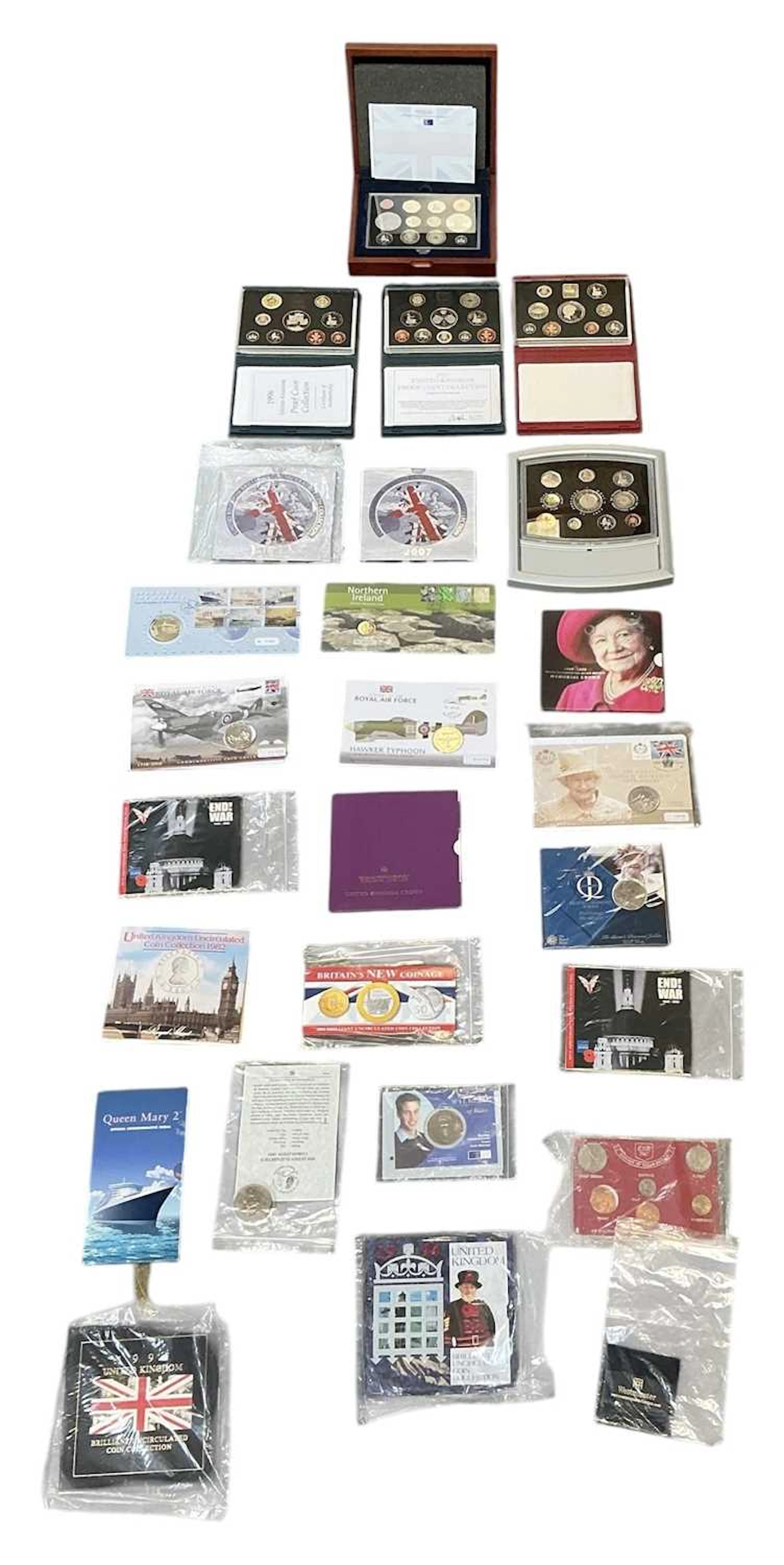 A quantity of assorted coin packs