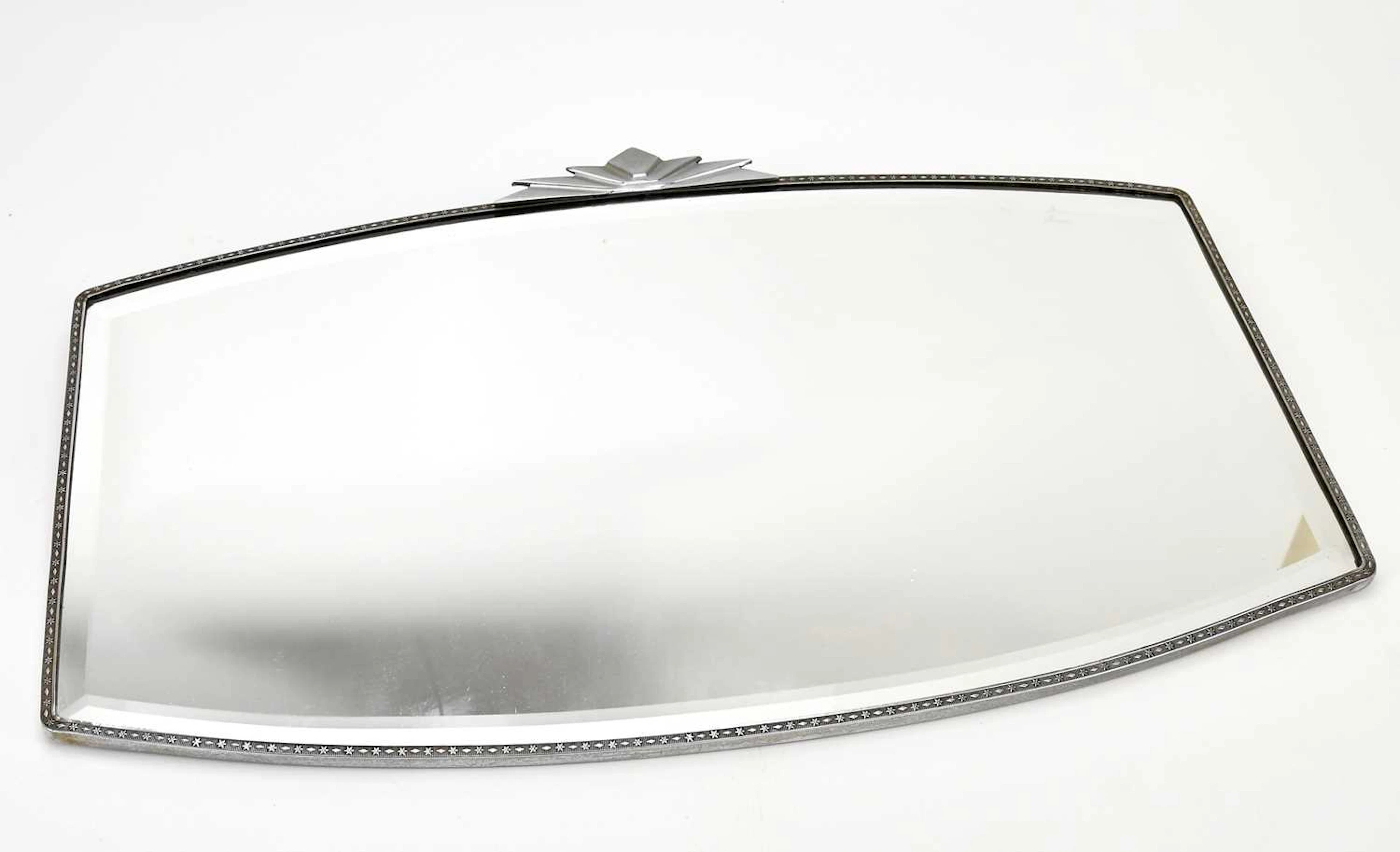 An Art Deco wall mirror with bevelled edge