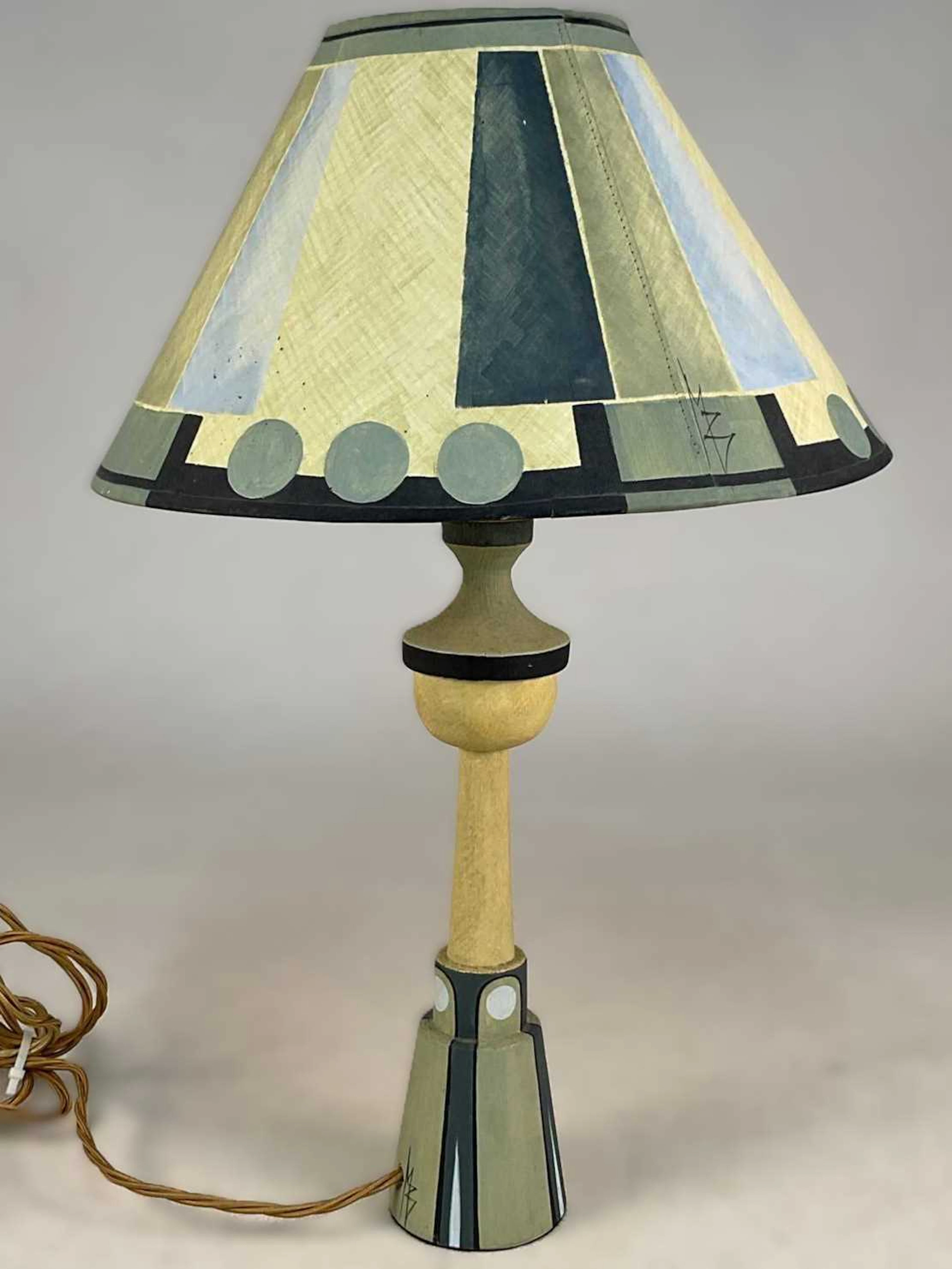 BLOOMSBURY INTERIORS; a handpainted wooden table lamp...