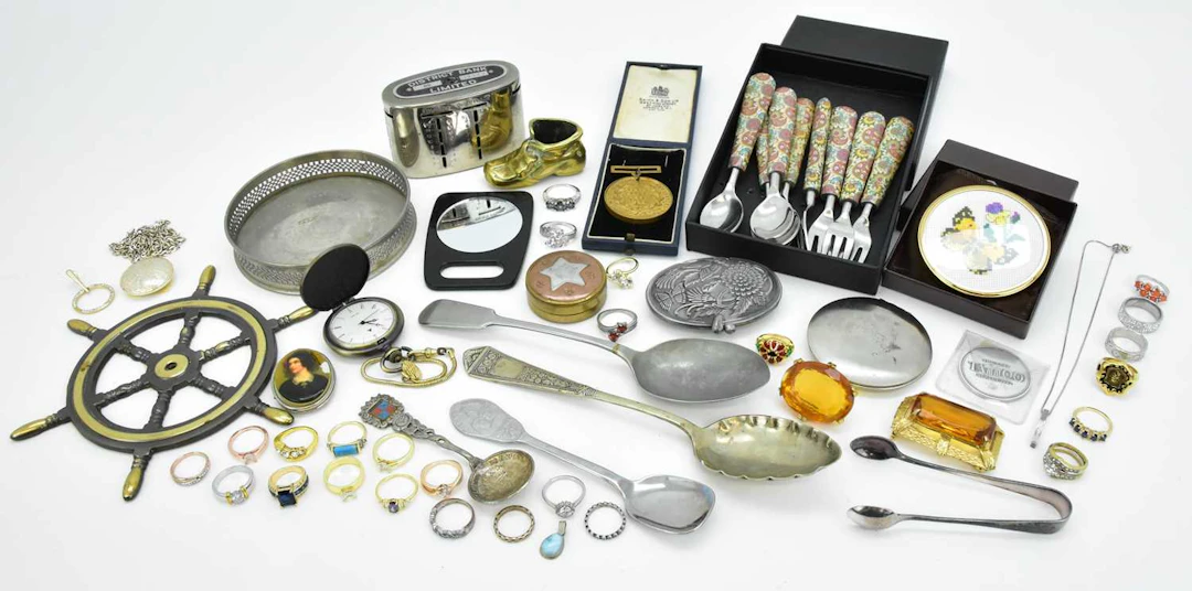 Various collectibles including a District Bank Ltd money box (no key)