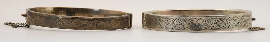 An Elizabeth II hallmarked silver hinged snap bangle