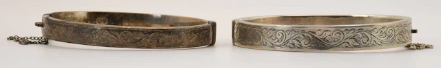 An Elizabeth II hallmarked silver hinged snap bangle
