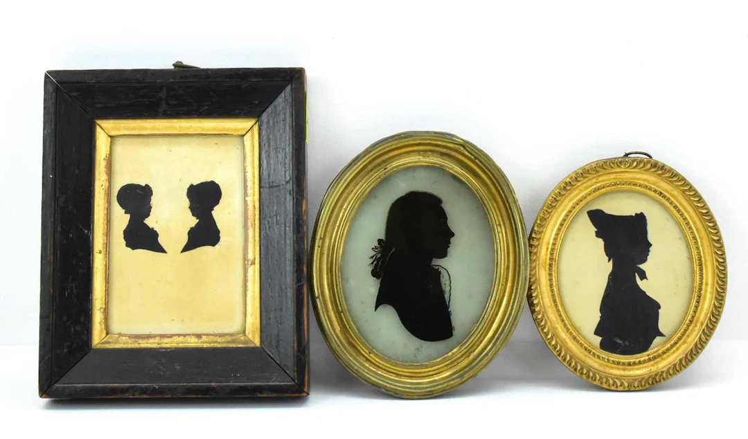 Three framed 18th and 19th century silhouettes comprising...