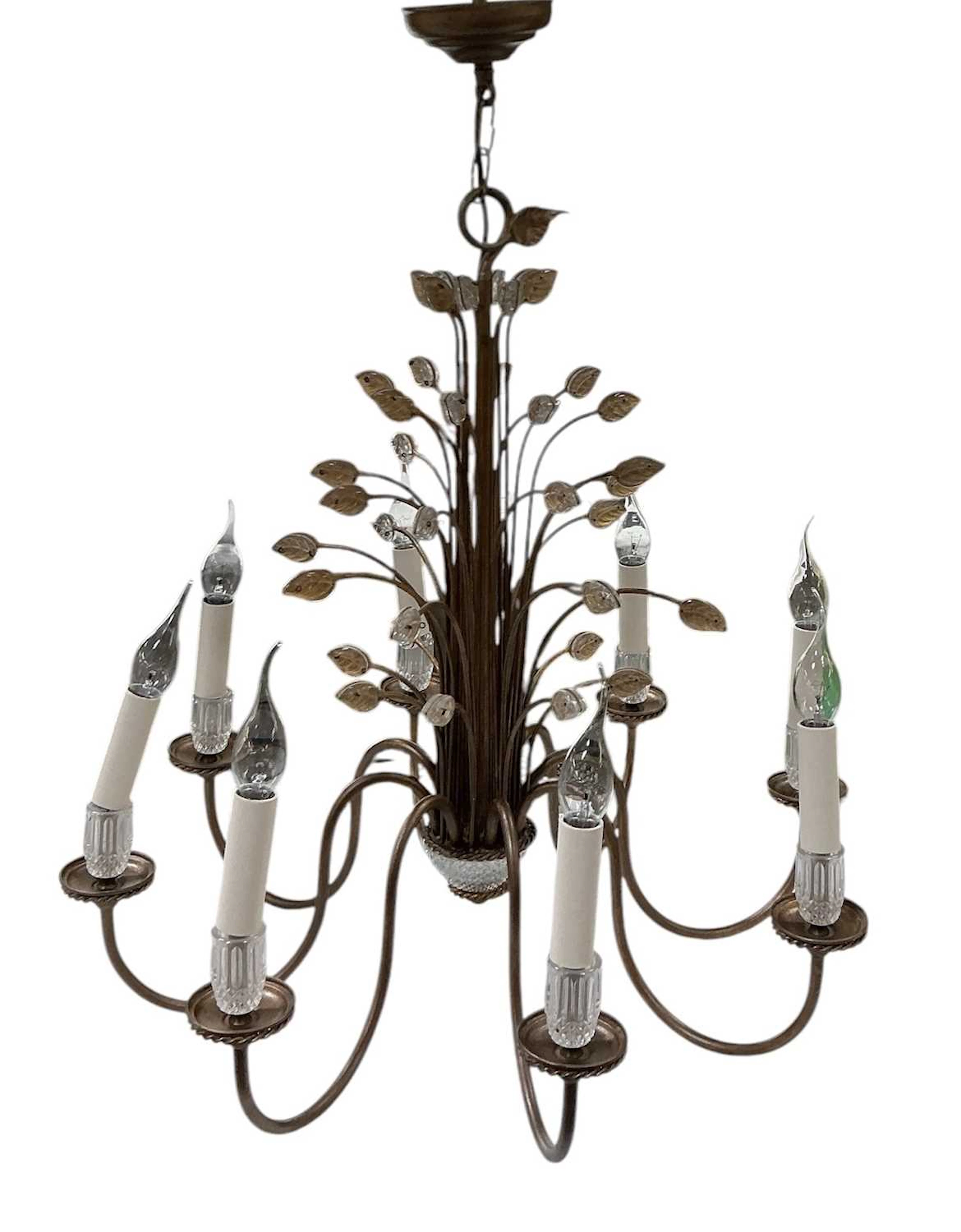 A modern contemporary bronzed eight branch gilt metal chandelier