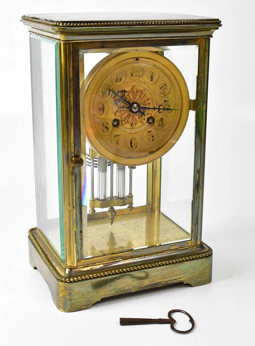 A 19th century style four-glass mantel clock