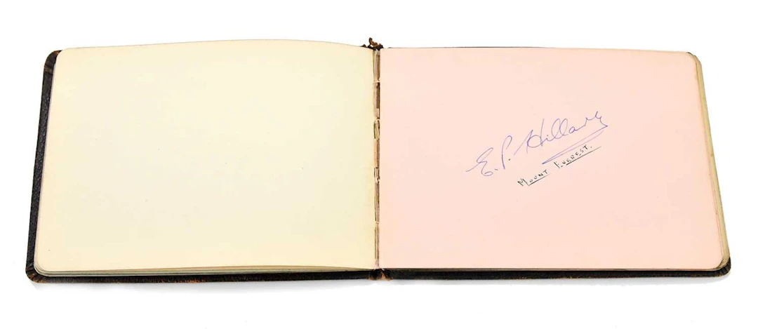 An autograph album to include