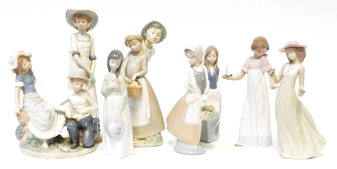 NAO; six porcelain figures of young women