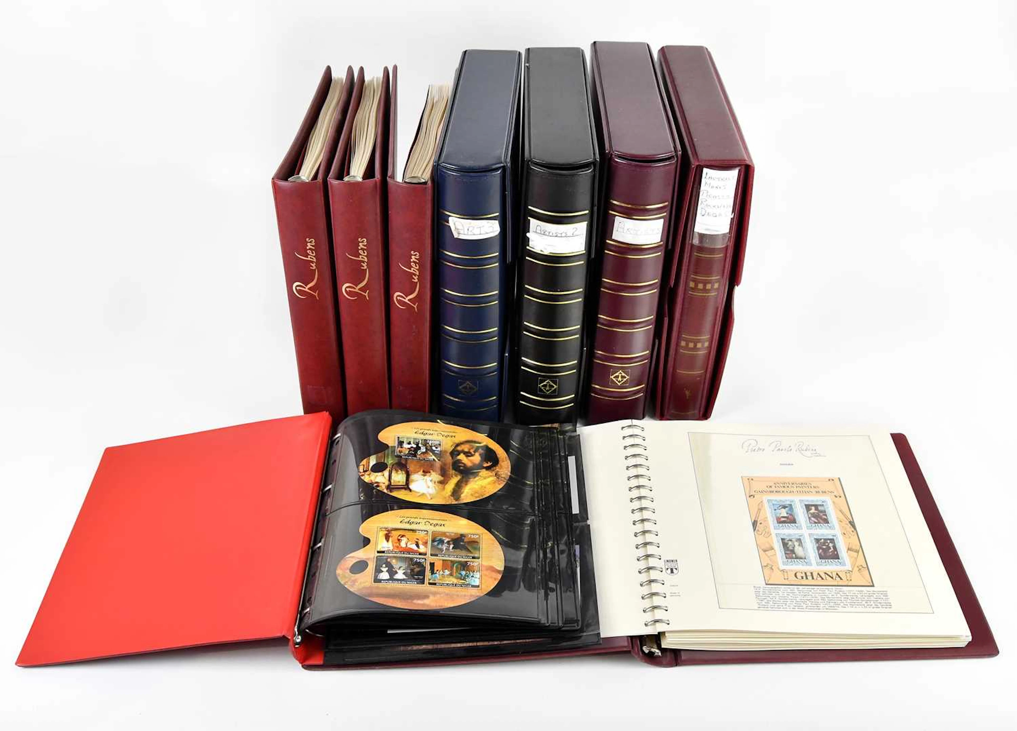 THEMATICS – ARTISTS; nine large albums of worldwide stamps