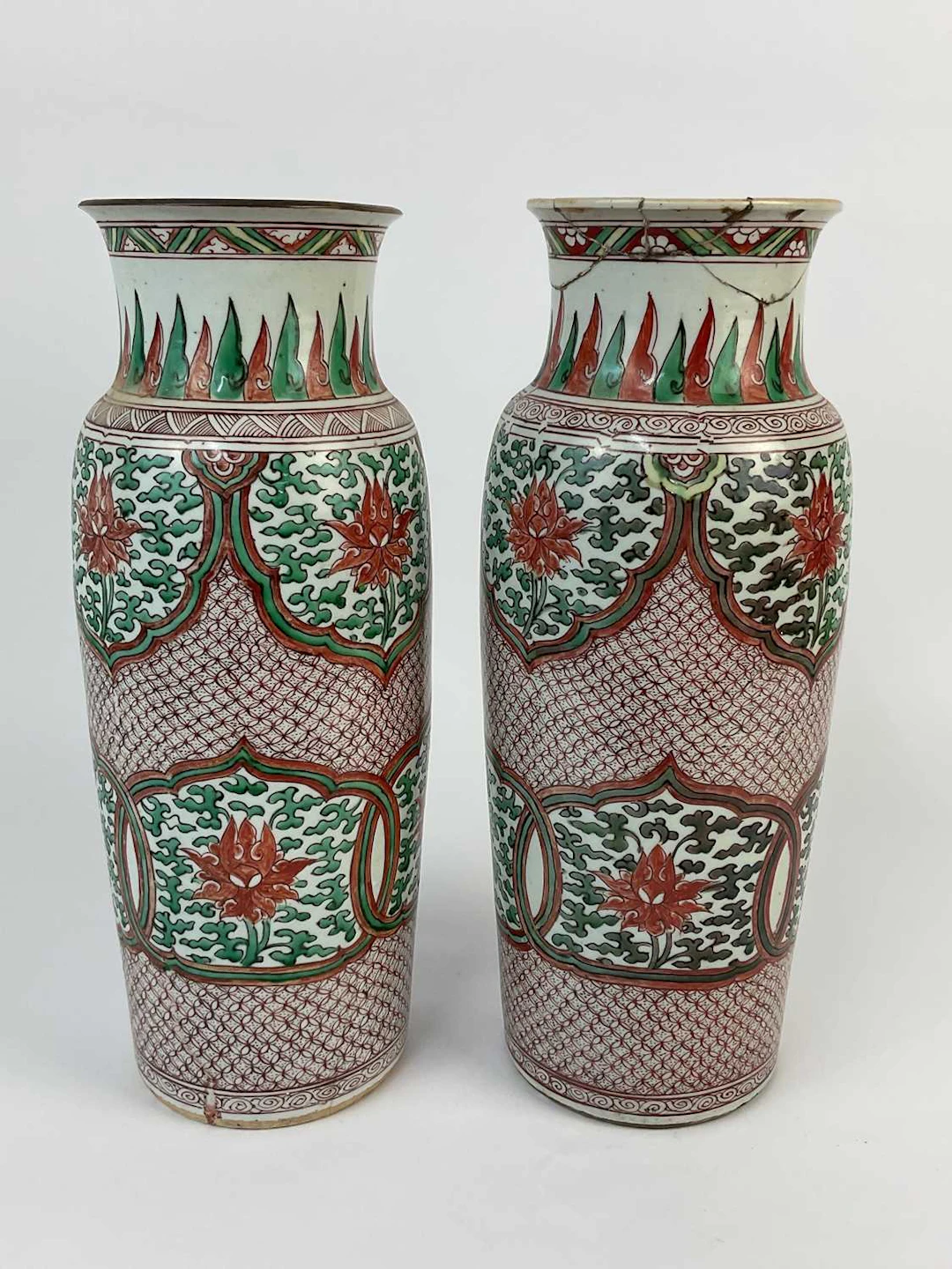 A pair of Chinese Wucai porcelain sleeve vases decorated...