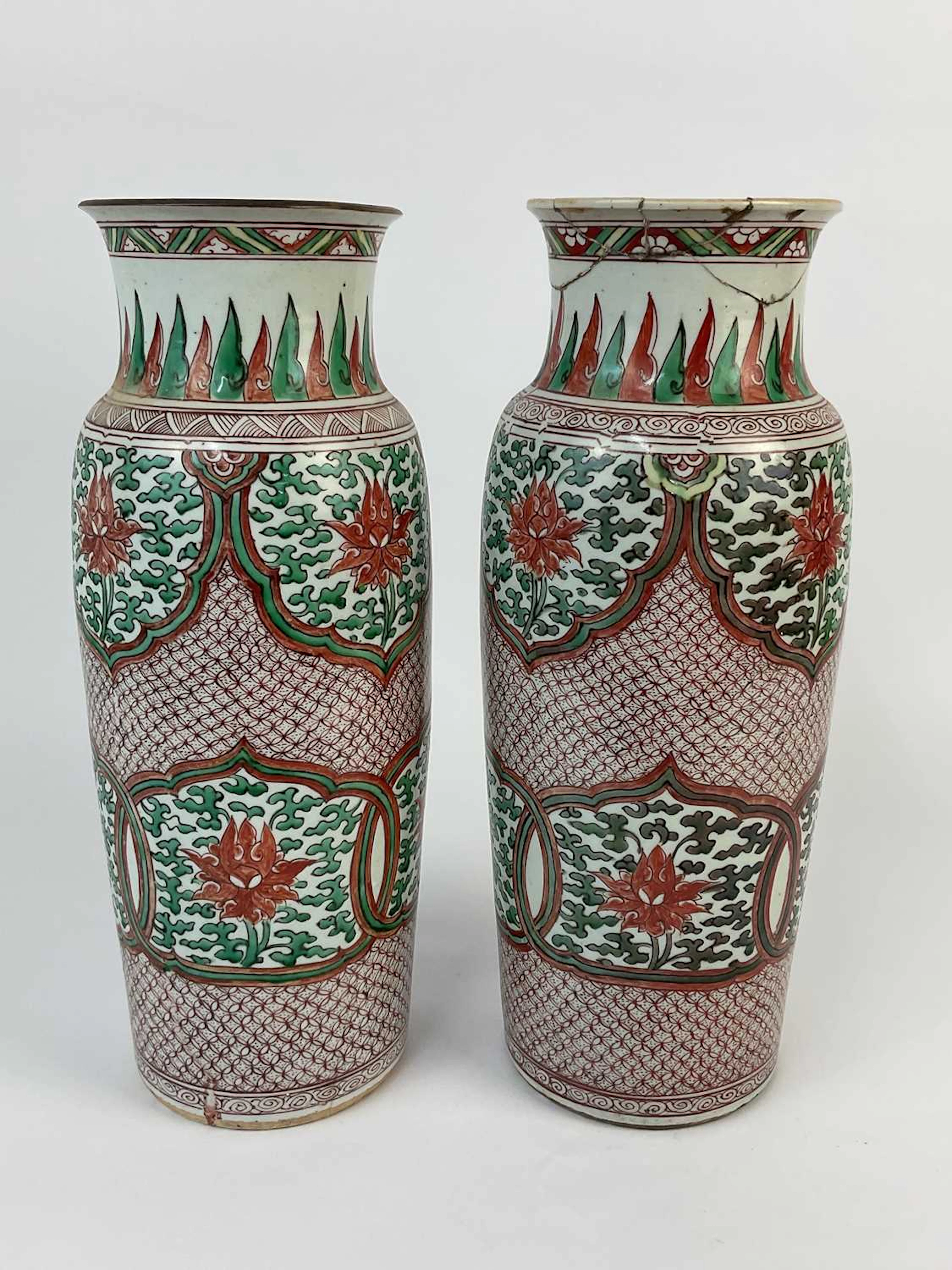 A pair of Chinese Wucai porcelain sleeve vases decorated...