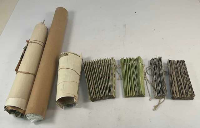 A quantity of bookbinder's marble sheets for end papers and the boards