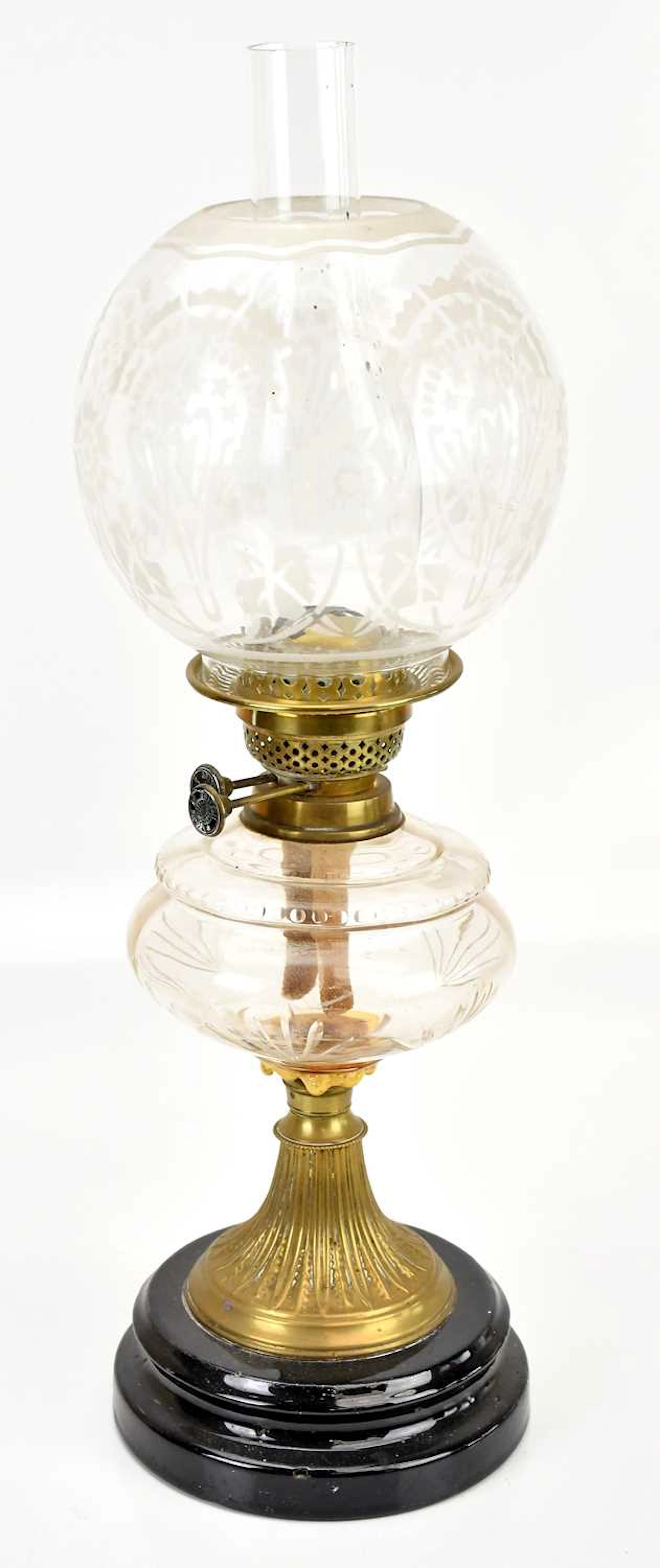 A brass and cut glass oil lamp