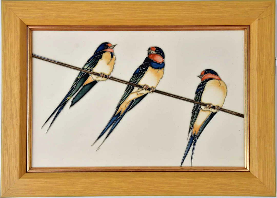 MOORCROFT; a framed ceramic plaque