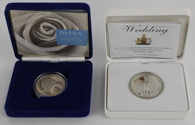 Two cased encapsulated silver proof coins