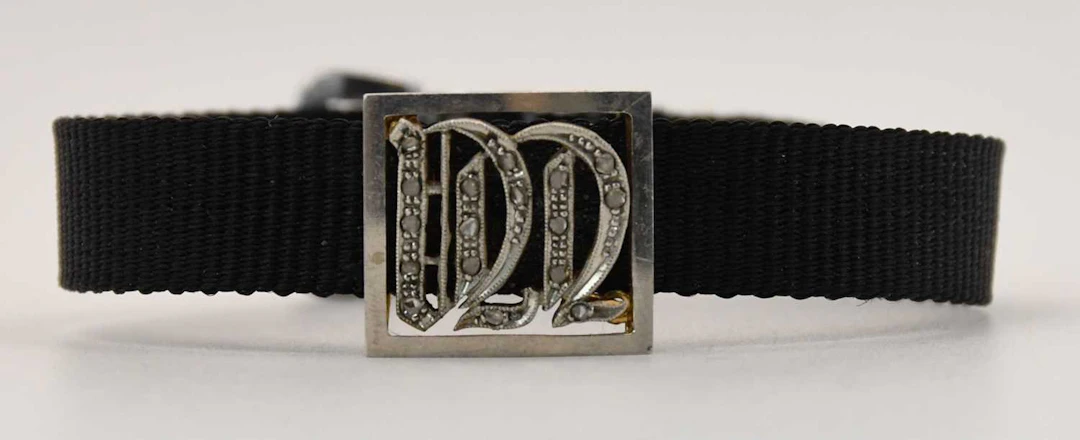 An early 20th century black fabric bracelet