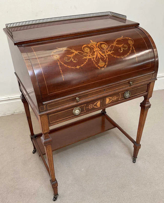 An Edwardian inlaid mahogany roll-top desk