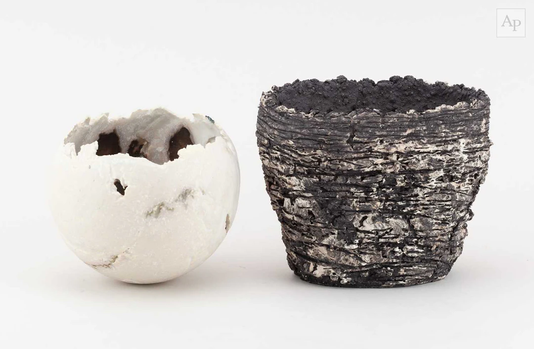 SARAH PURVEY (born 1968); a small oval black stoneware...