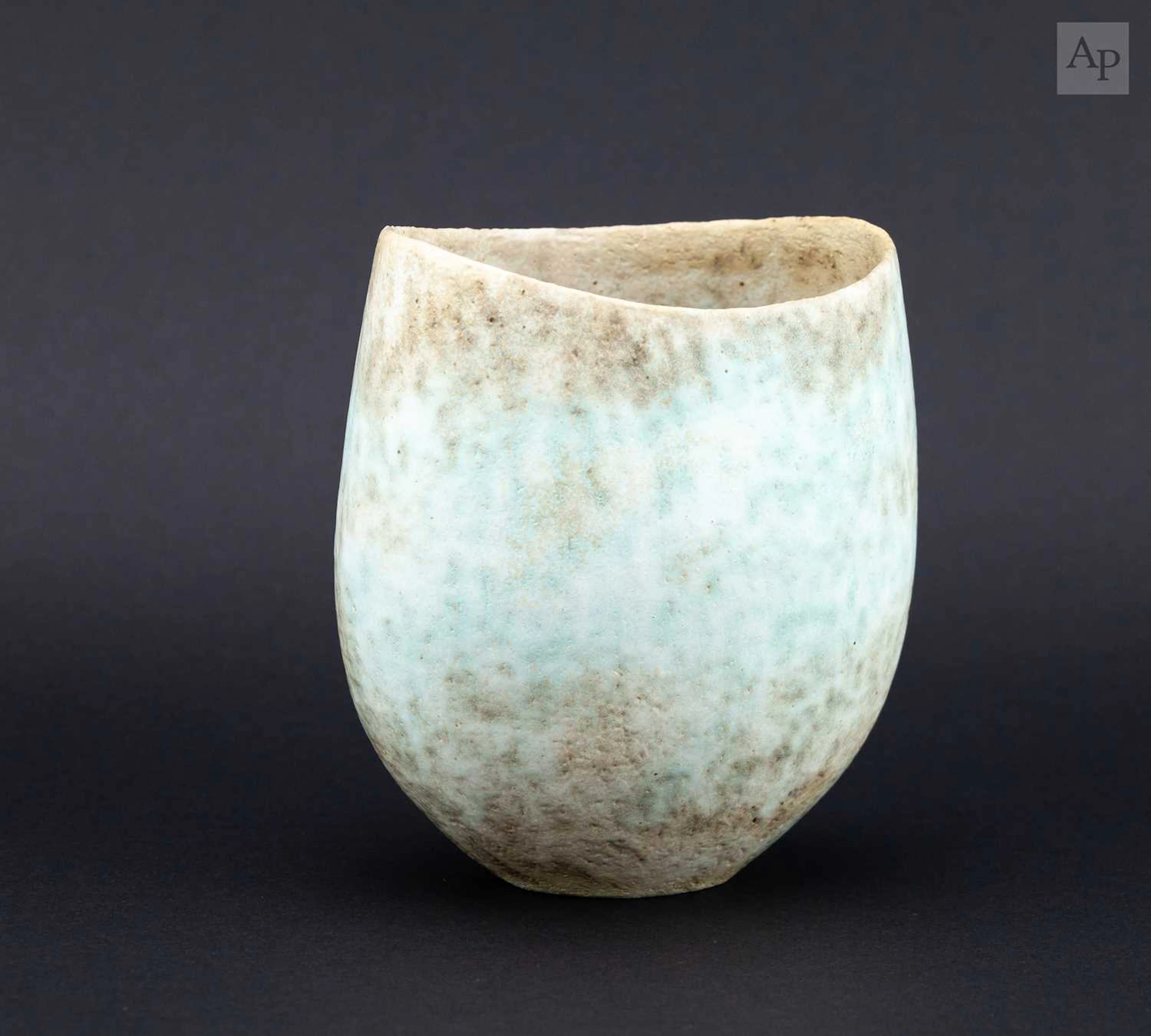 JOHN WARD (1938-2023); a small oval stoneware vessel...
