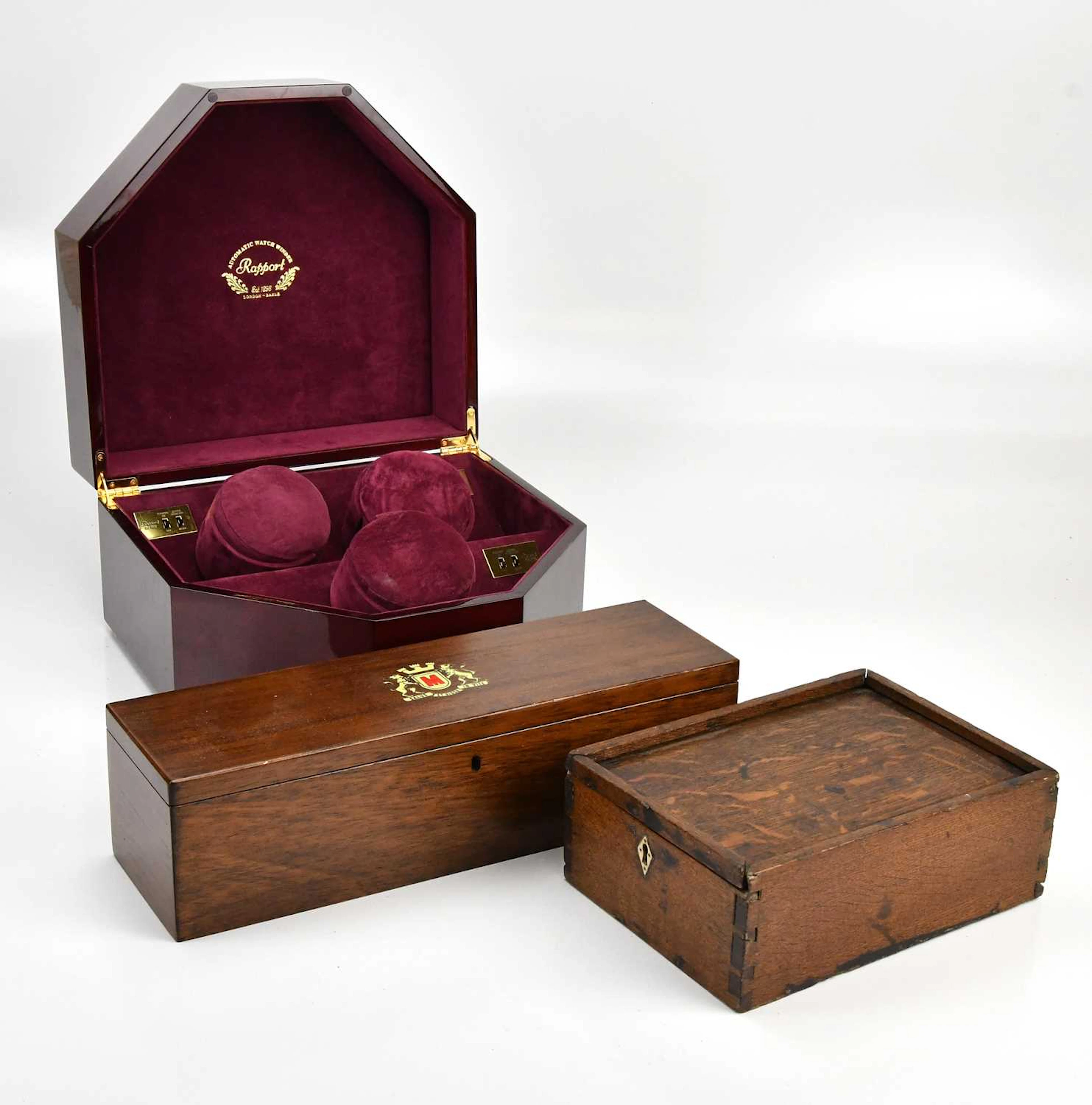 An early 19th century oak storage box with sliding top