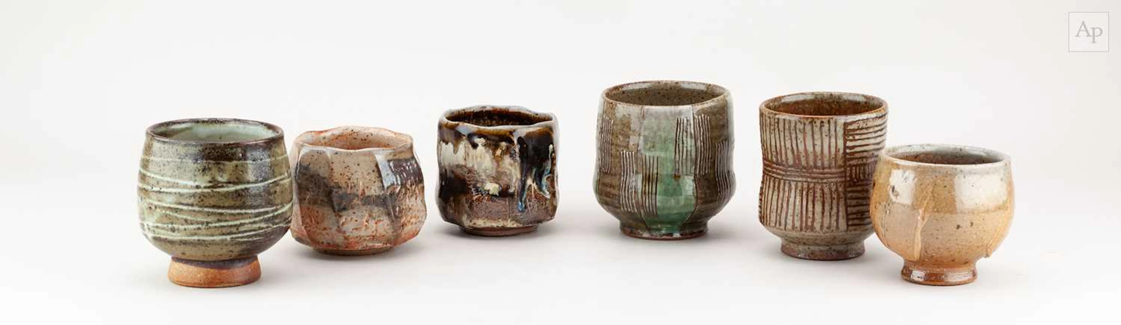 A group of stoneware yunomi and cups by Mark Griffiths