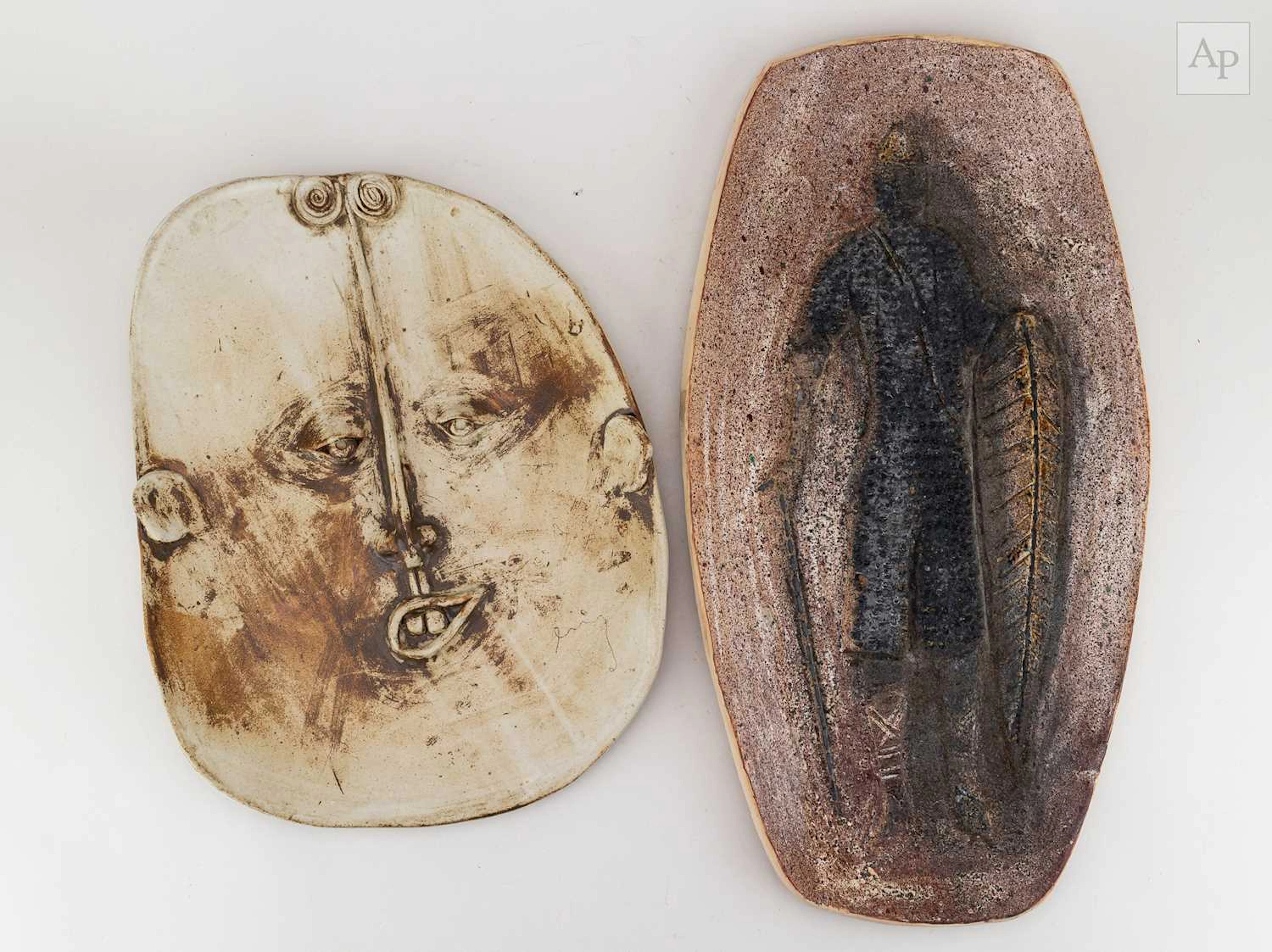 B SCHILL; an elongated stoneware platter decorated with a medieval knight