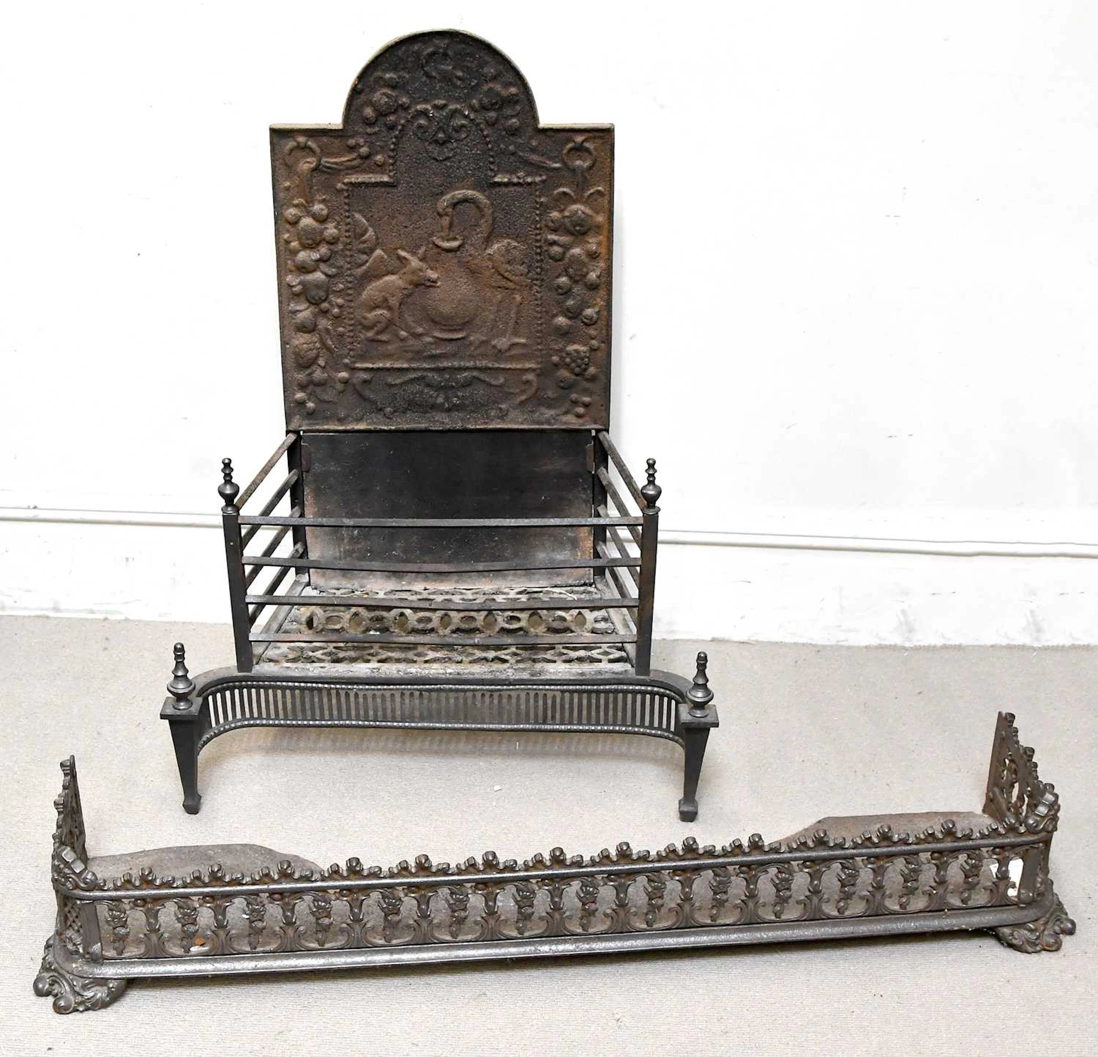 A 19th century cast and wrought iron fire grate
