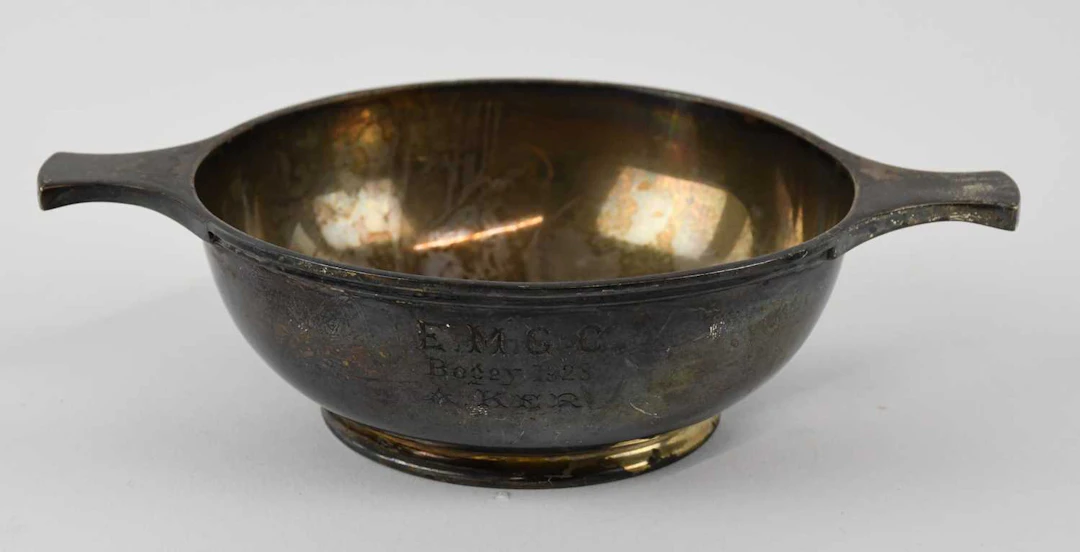 A George V hallmarked silver circular twin handled bowl/quaich