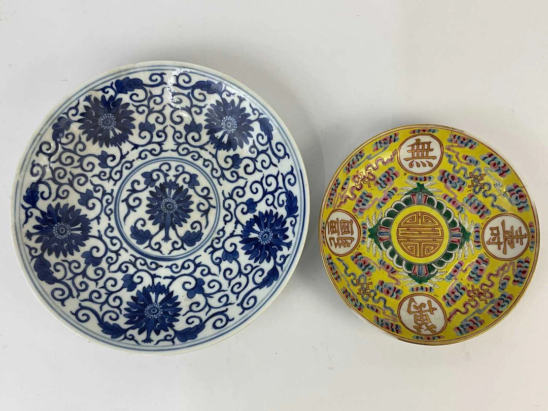 A Chinese yellow ground Famille Rose dish