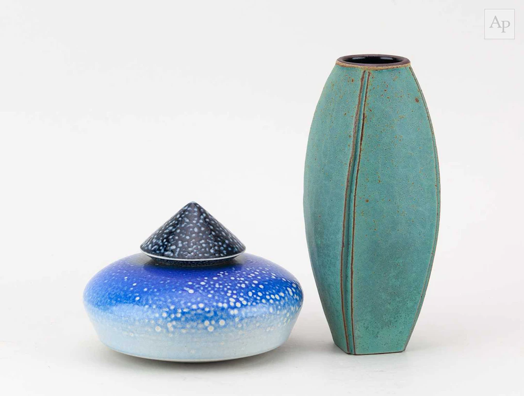 EMILY MYERS (born 1965); a faceted terracotta vase covered in turquoise glaze