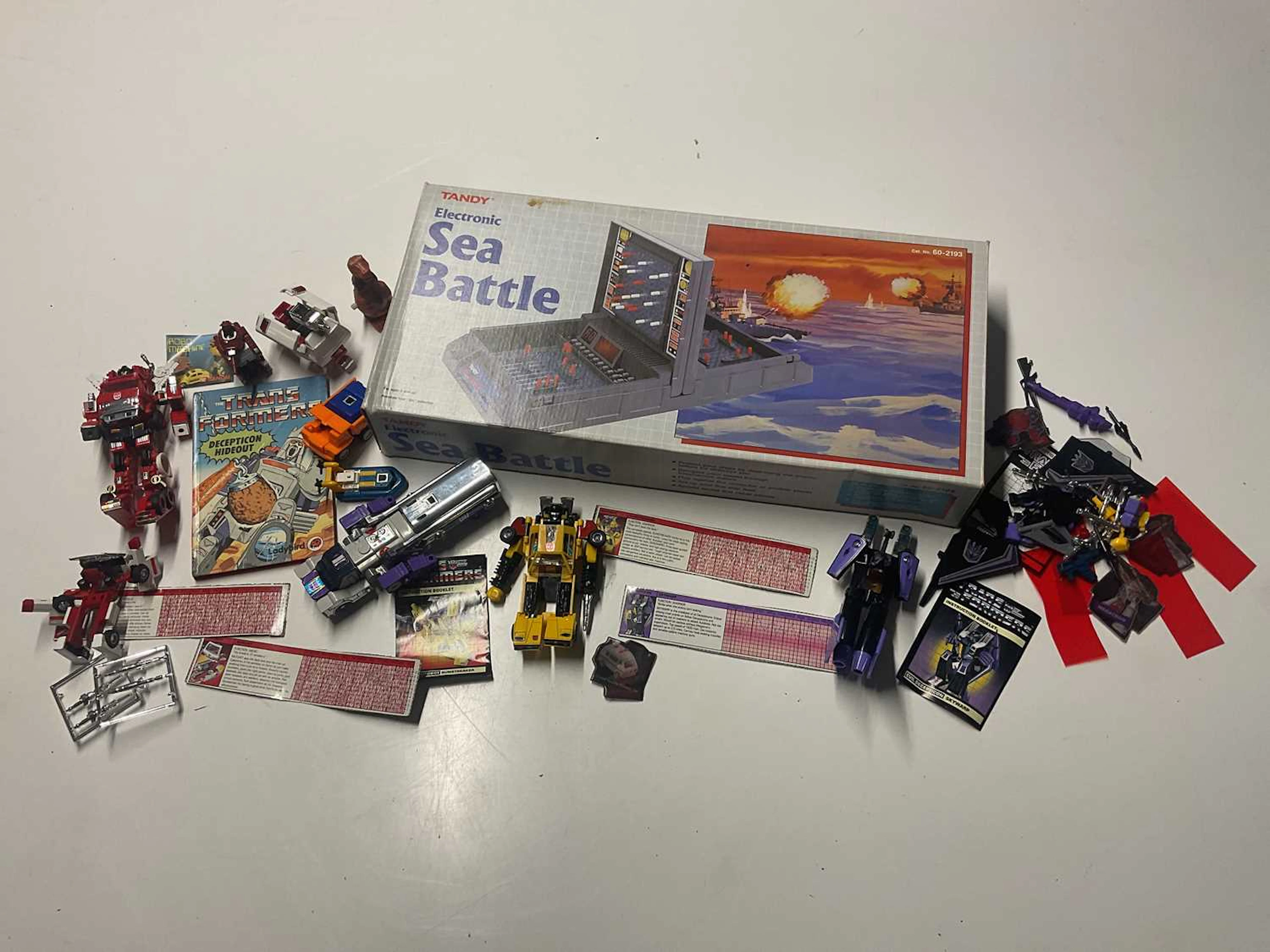 A quantity of Bandai Transformer toys