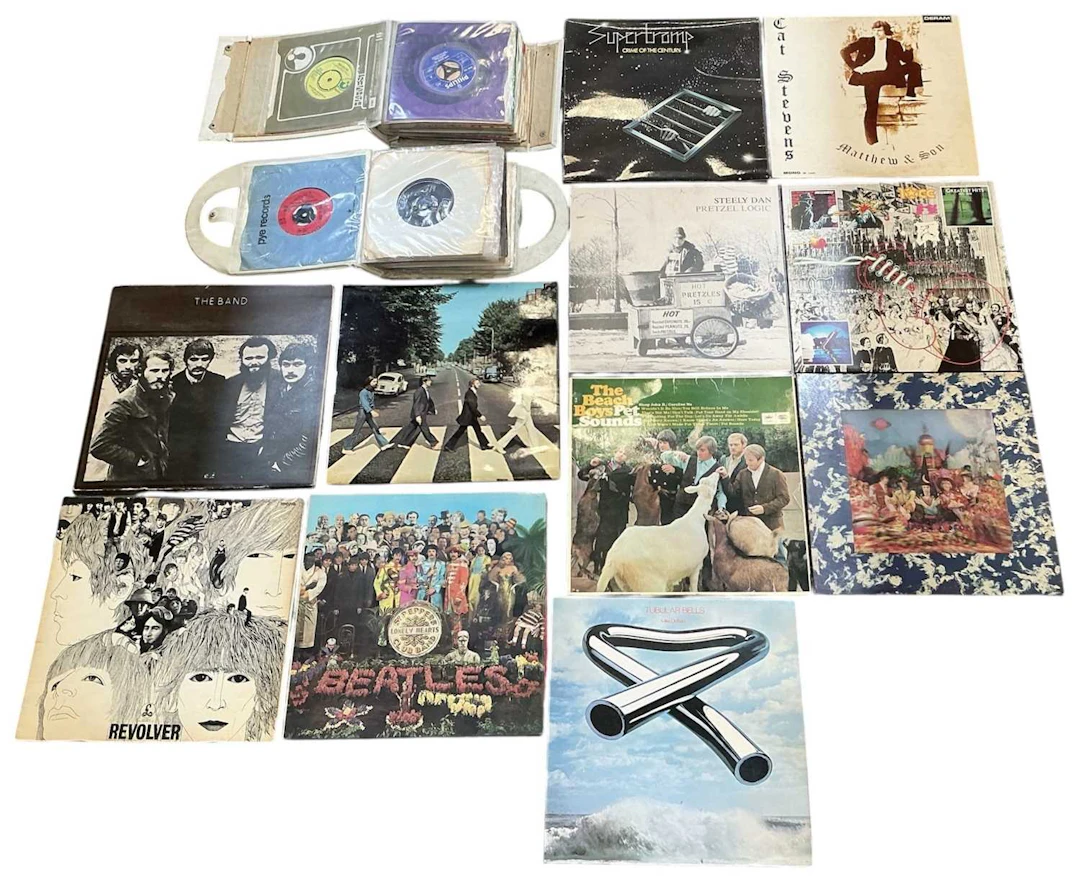 Eleven assorted records and LPs