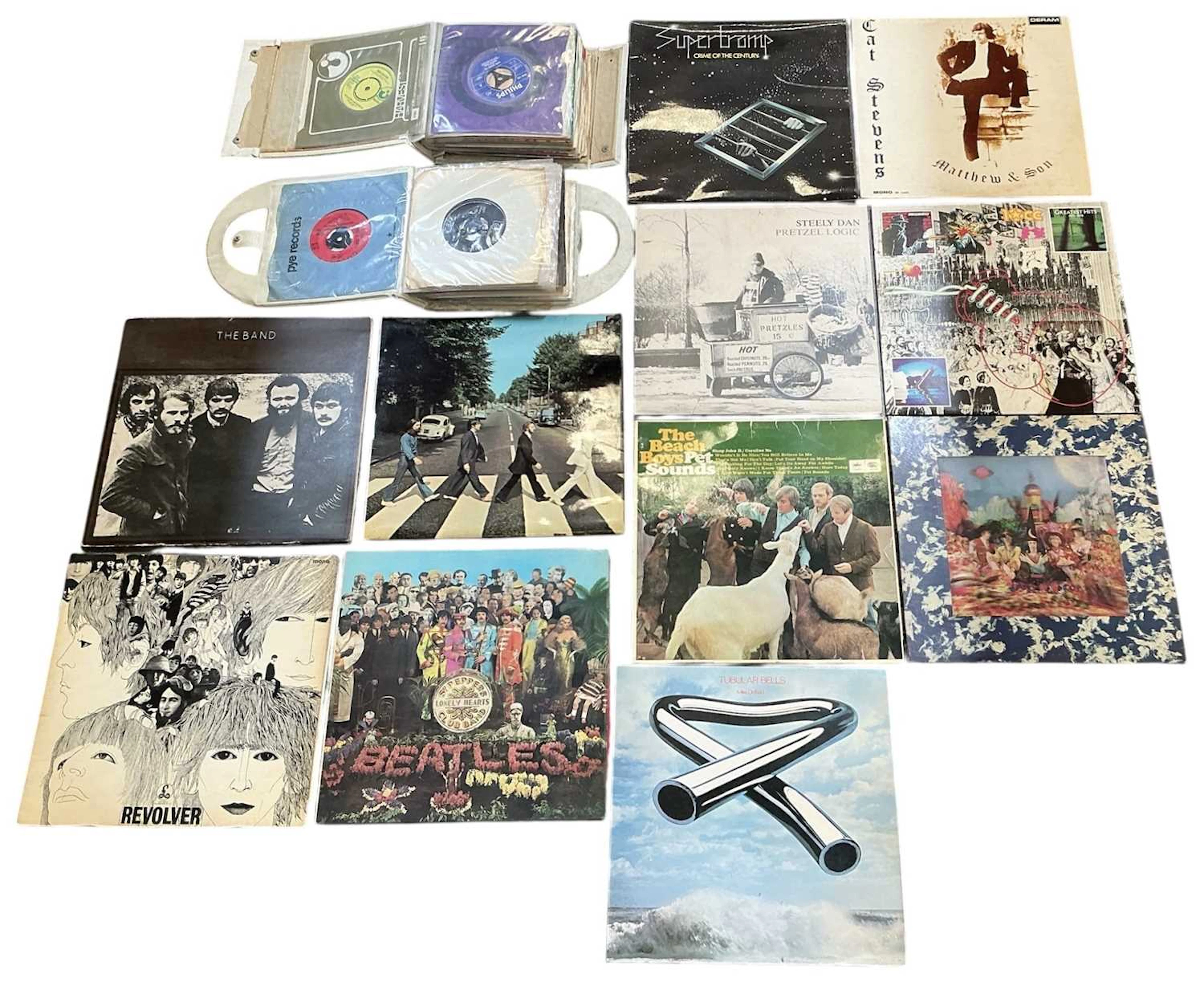 Eleven assorted records and LPs