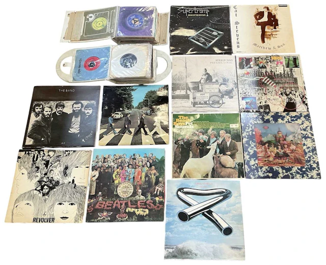 Eleven assorted records and LPs