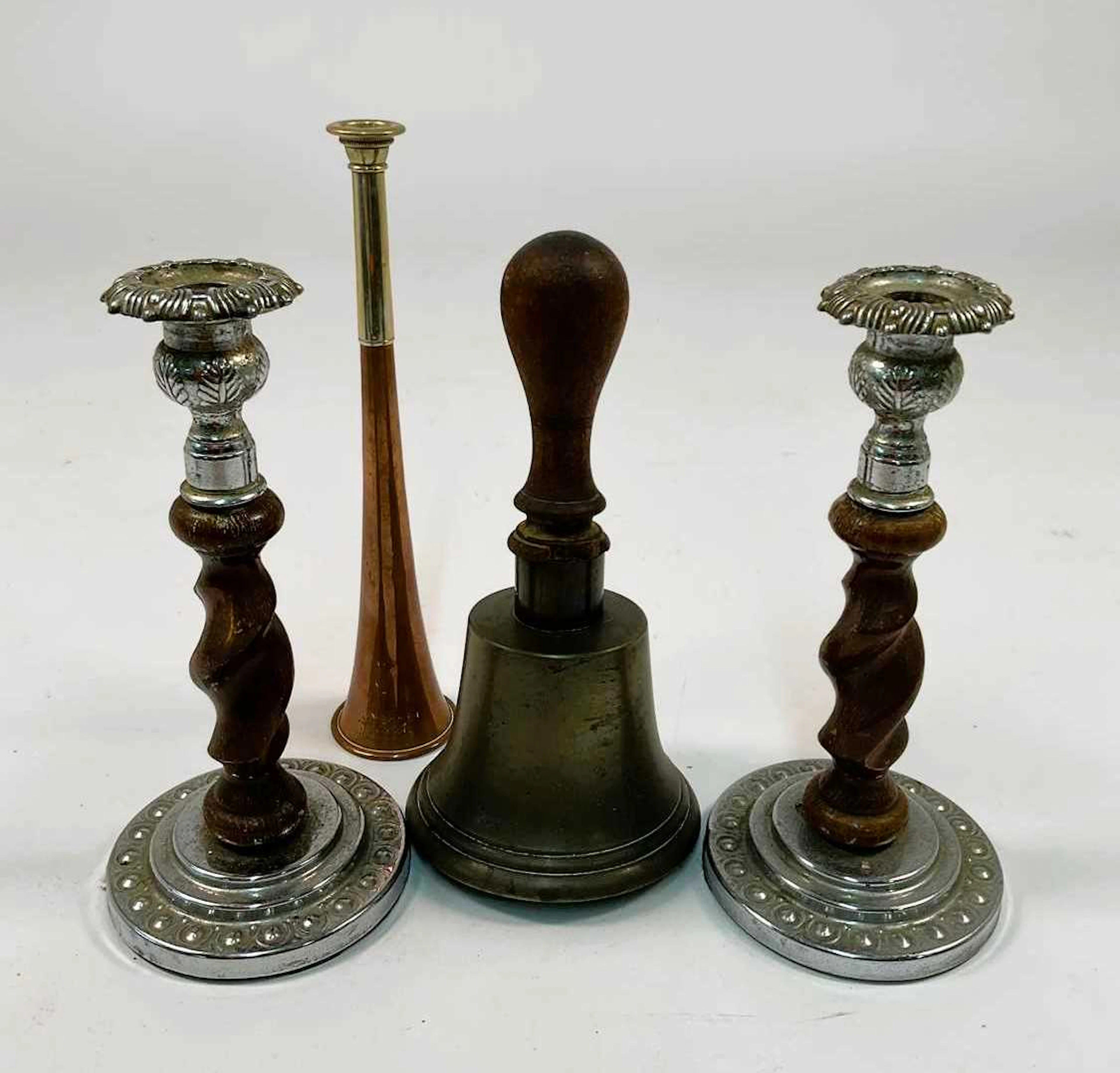 A small brass handbell