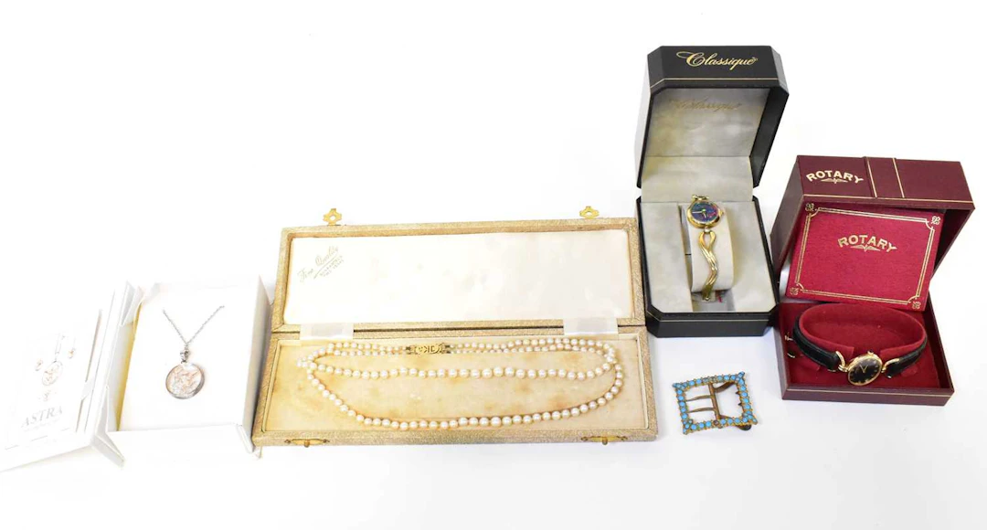 A cased double strand pearl necklace with 9K gold mount
