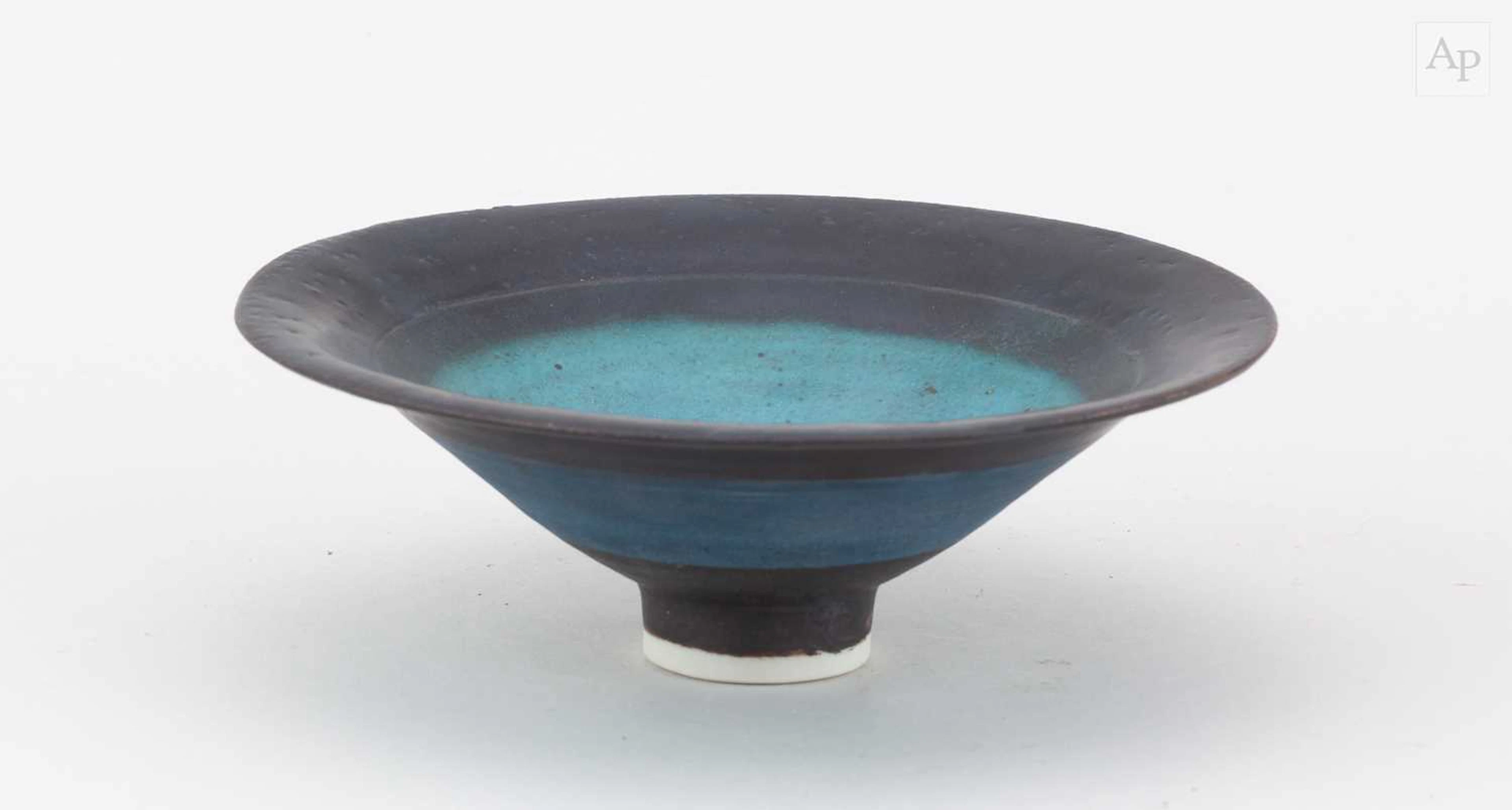 EMMANUEL COOPER (1938-2012); a shallow porcelain bowl...