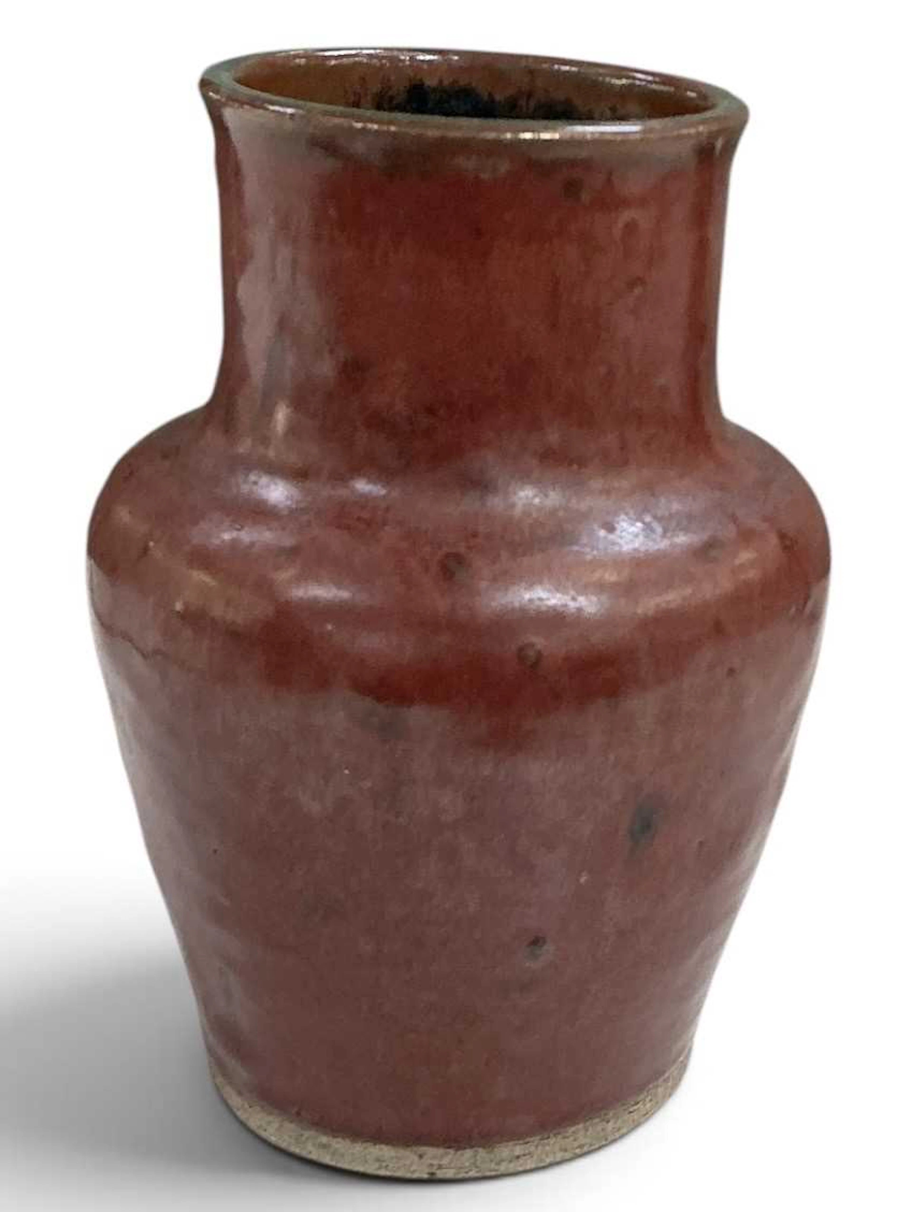 WILLIAM STAITE MURRAY (1881-1962); a red flambé glazed stoneware vase