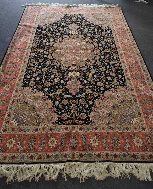 A large Persian Tabriz carpet