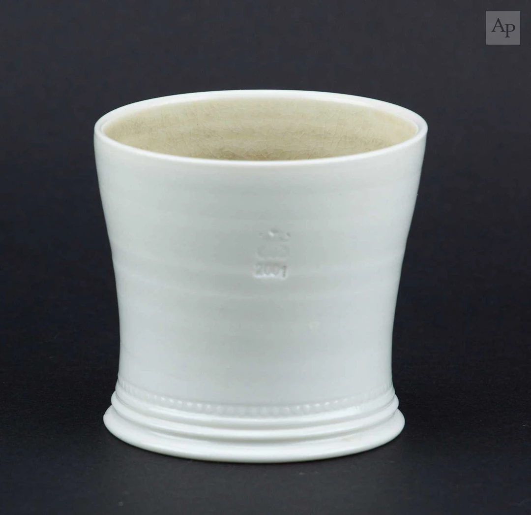 STEVE HARRISON (born 1967); a salt glazed porcelain beaker
