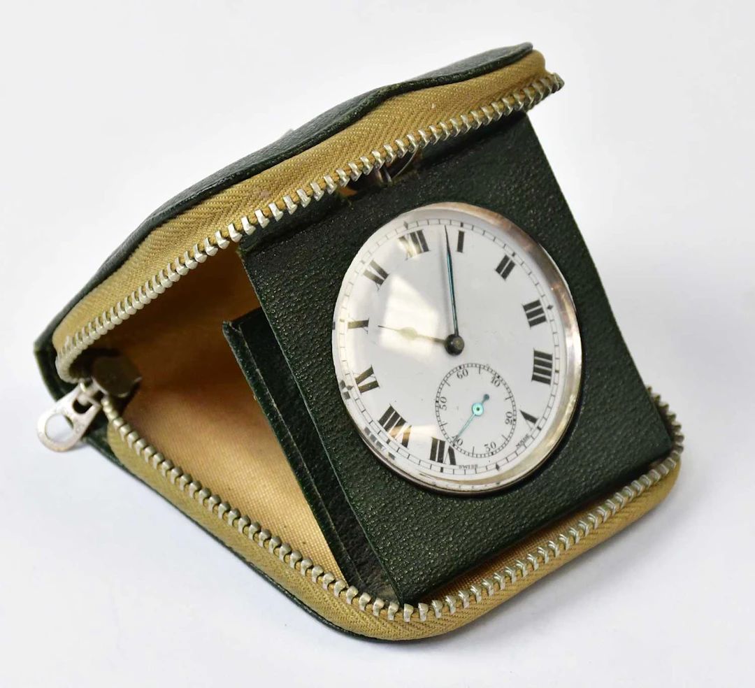 A hallmarked silver open face crown wind pocket watch