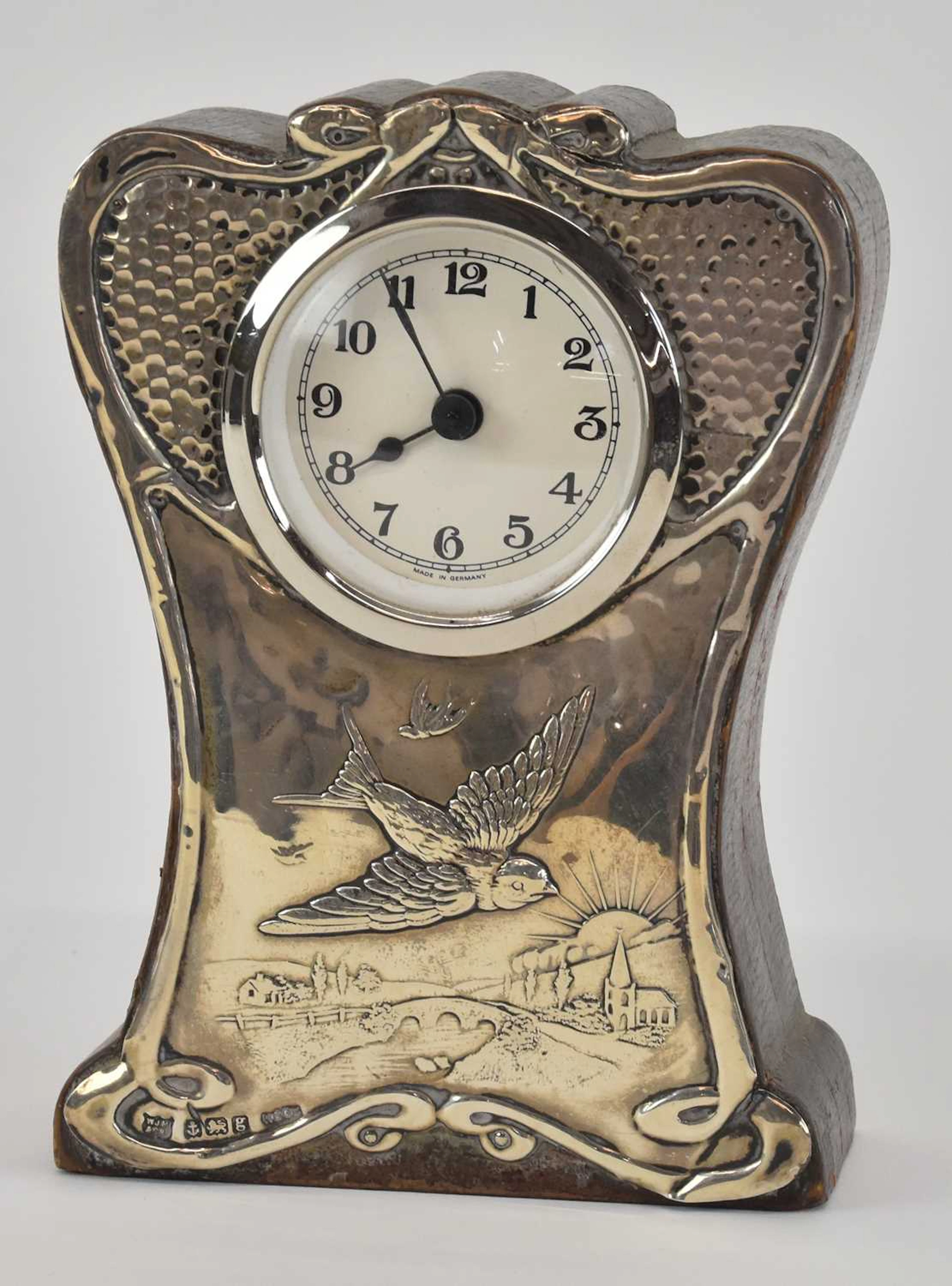 W J MYATT & CO; an Edward VII hallmarked silver mounted travelling mantel clock