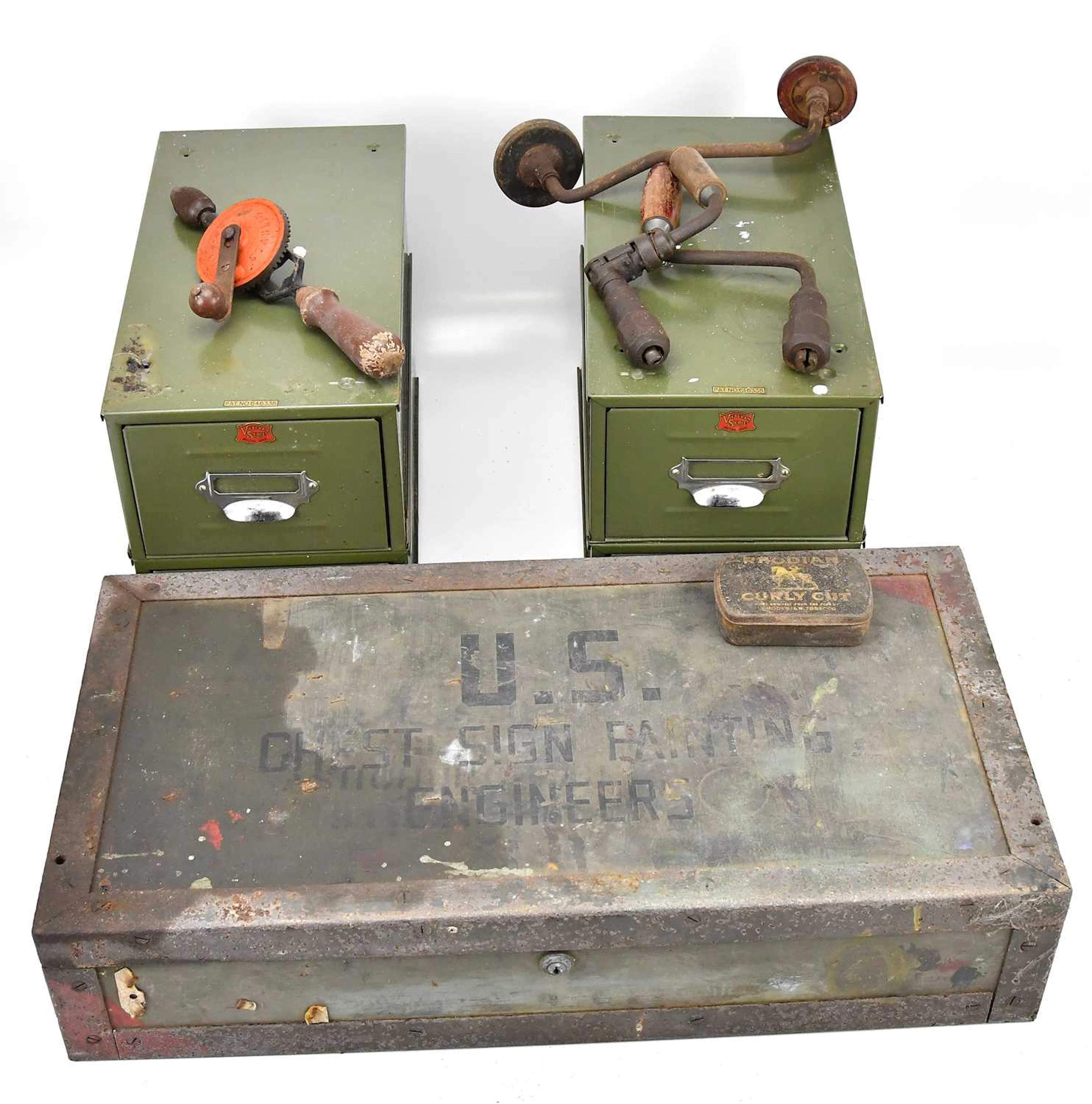 Four vintage green metal filing cabinets