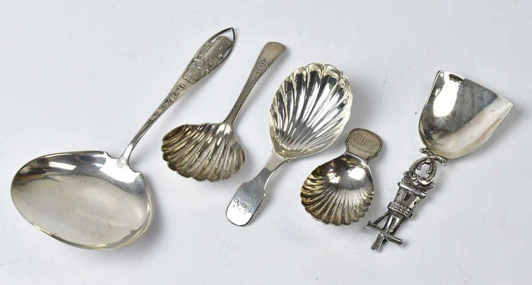 Five hallmarked silver caddy spoons